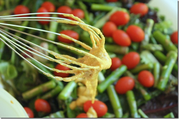 spring-asparagus-salad-tossing